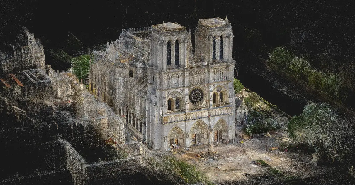 Comprehensive 3D point cloud rendering generated from laser scanning campaigns, displaying the twin towers and facade of Notre-Dame Cathedral.